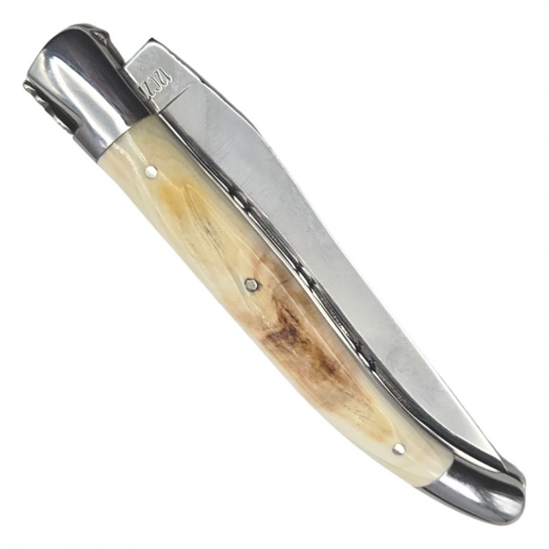 Couteau Laguiole en Aubrac ivoire phacochère double platine
