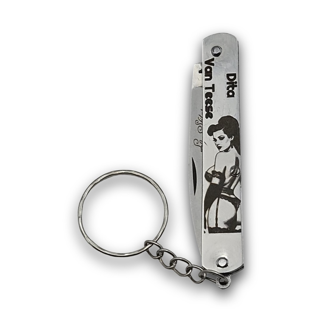 Couteau porte clefs pin up...